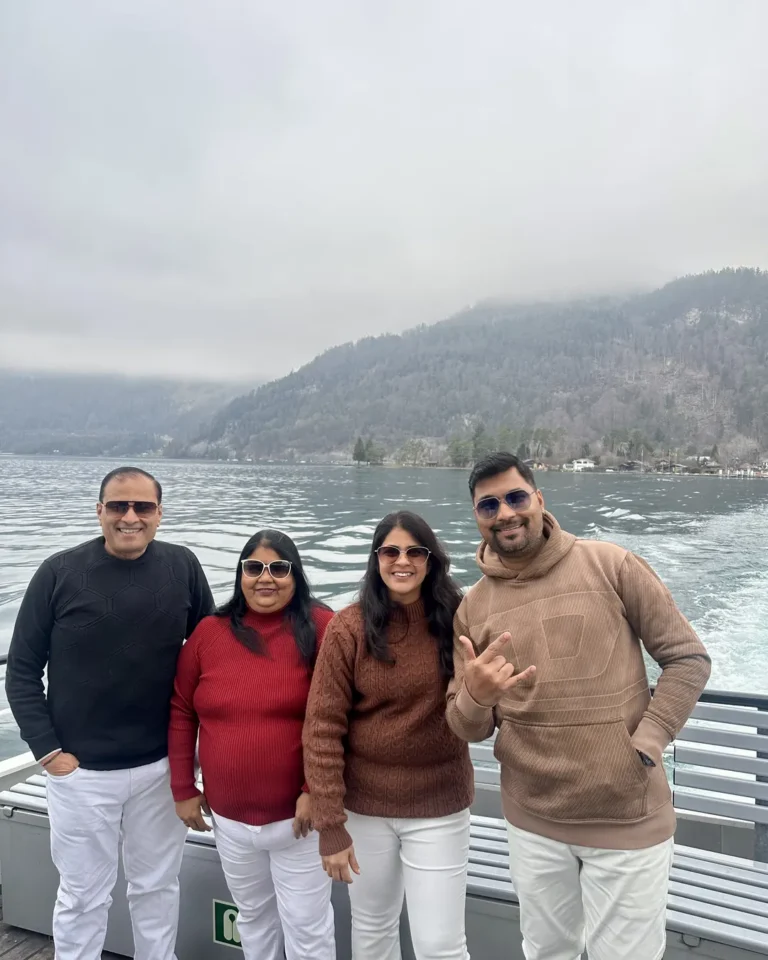 Home 9 Kiran and family, Naviora Journeys clients, on a lake boat in Interlaken
