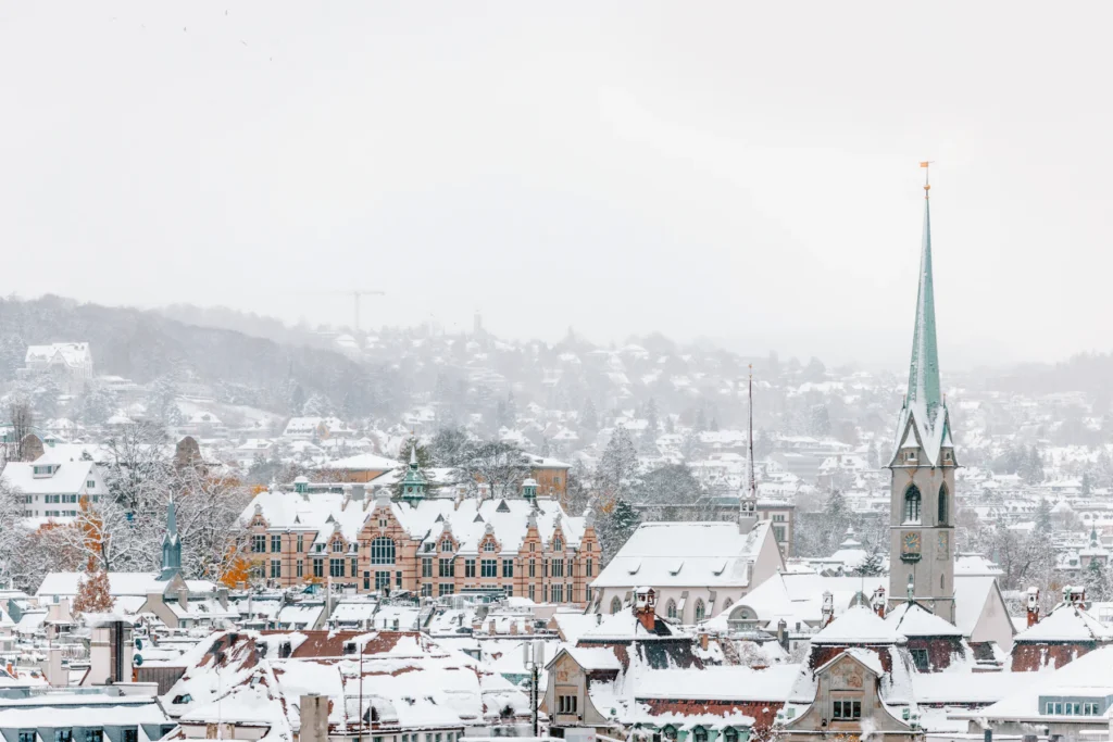 Best Time to Visit Switzerland: A Month-by-Month Guide 5 Zurich's old town after a winter snowfall